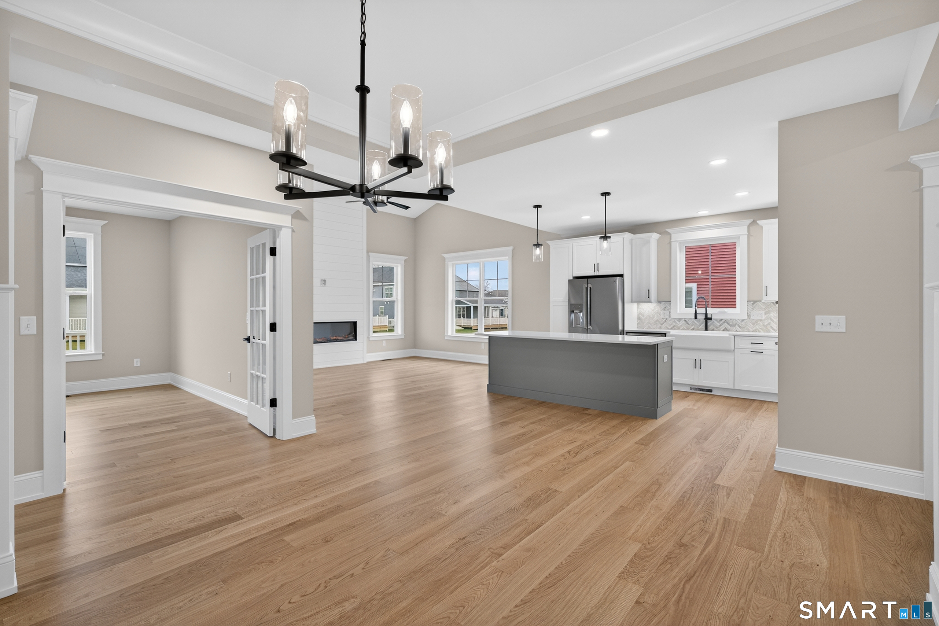 45 Summertime Circle Pawcatuck, CT 06379 - Photo 25 of 35 a view of a large kitchen with a sink a refrigerator and a stove top oven