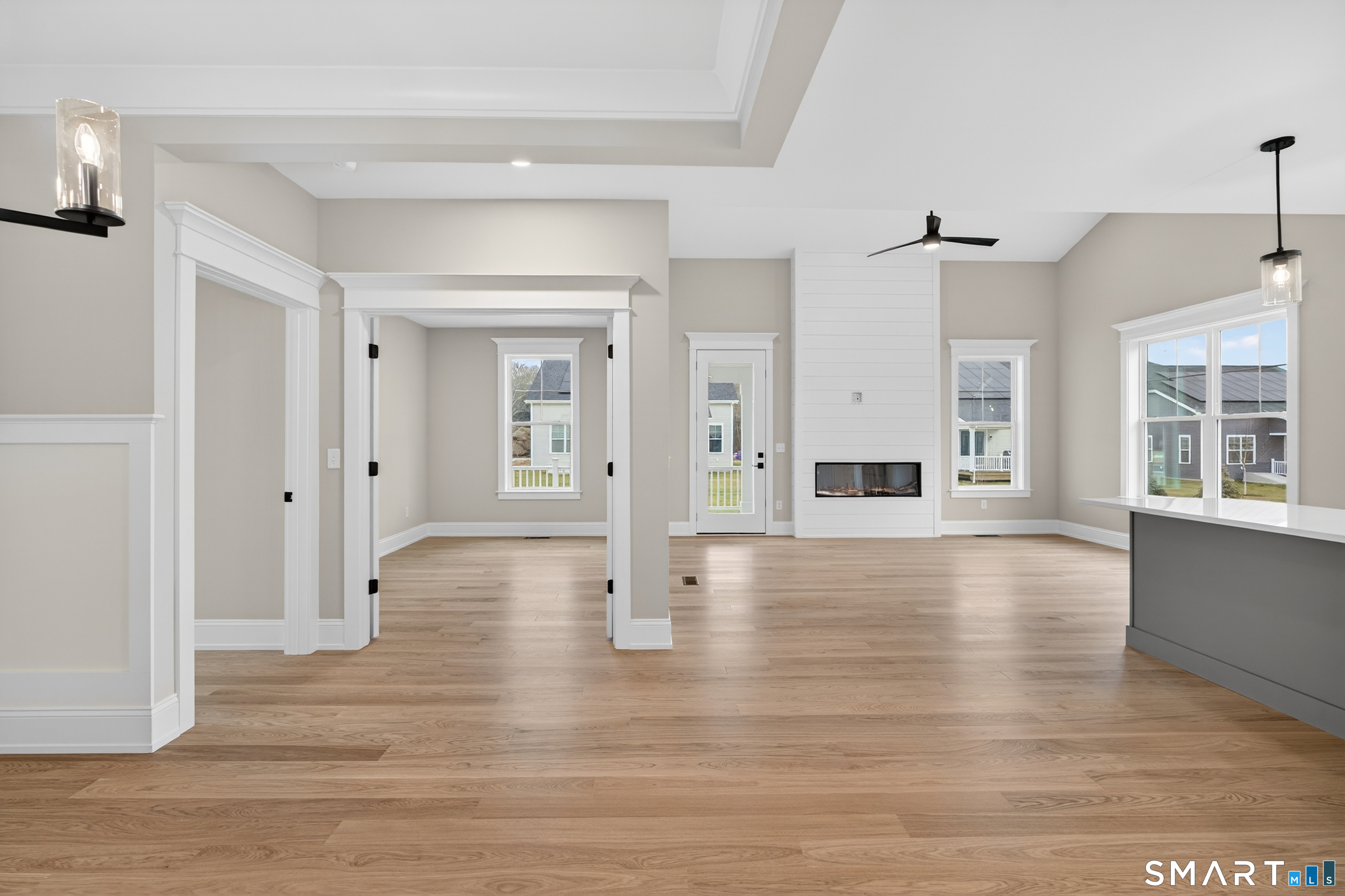 45 Summertime Circle Pawcatuck, CT 06379 - Photo 26 of 35 a view of an empty room with window and wooden floor