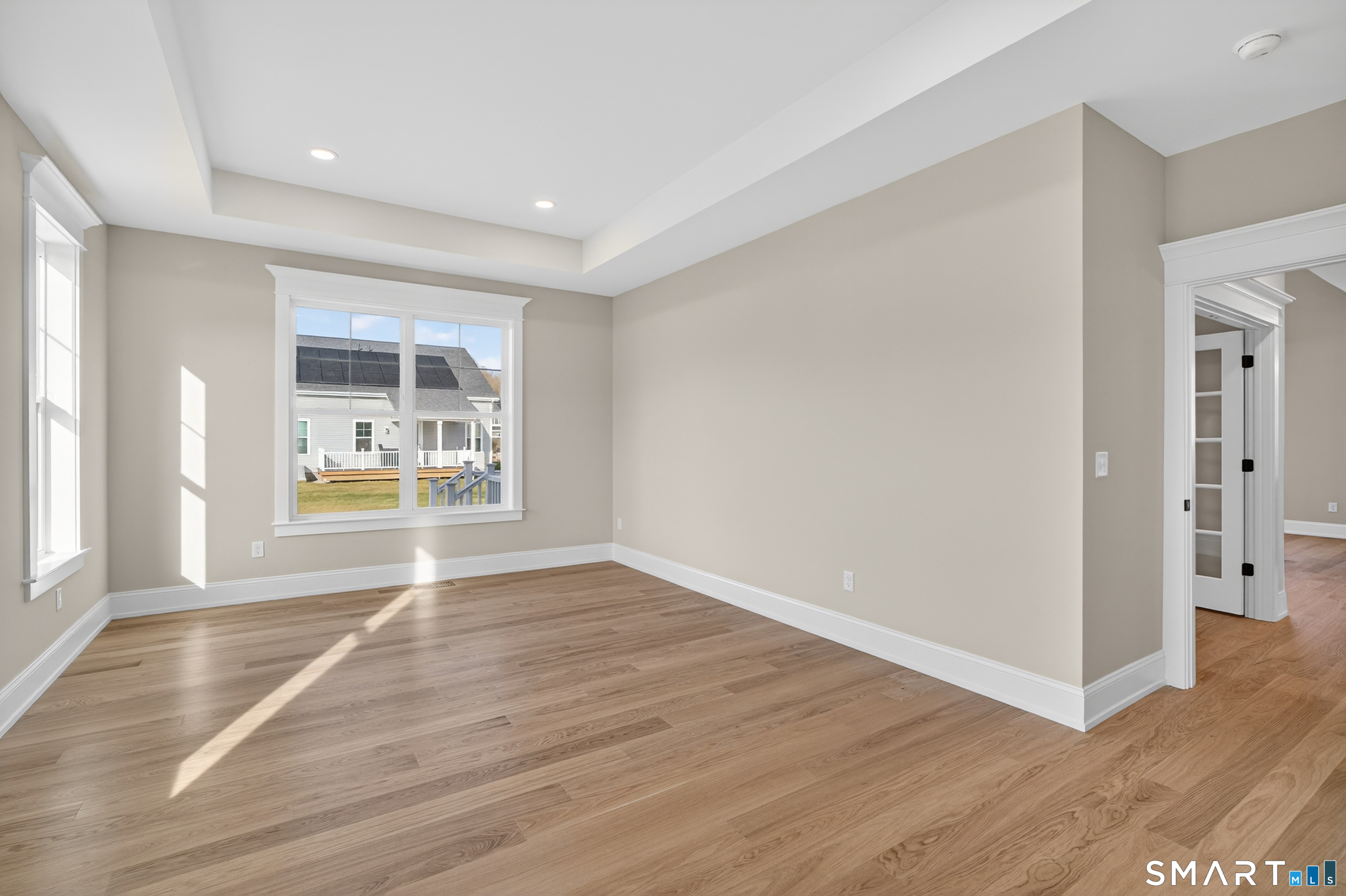 45 Summertime Circle Pawcatuck, CT 06379 - Photo 28 of 35 wooden floor in an empty room with a window