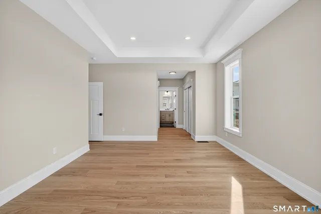 a bathroom with a shower and a sink