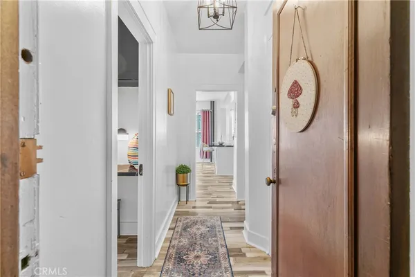 a bathroom with a granite countertop shower and a mirror