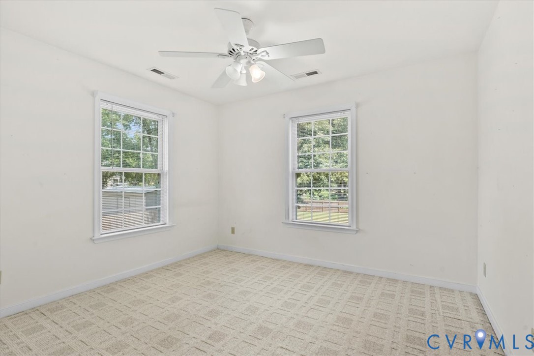 2924 Warfield Ridge Terrace Chester, VA 23831 - Photo 37 of 38 Bright room featuring two windows, neutral wall co