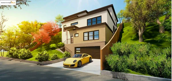 a front view of a house with a yard and potted plants