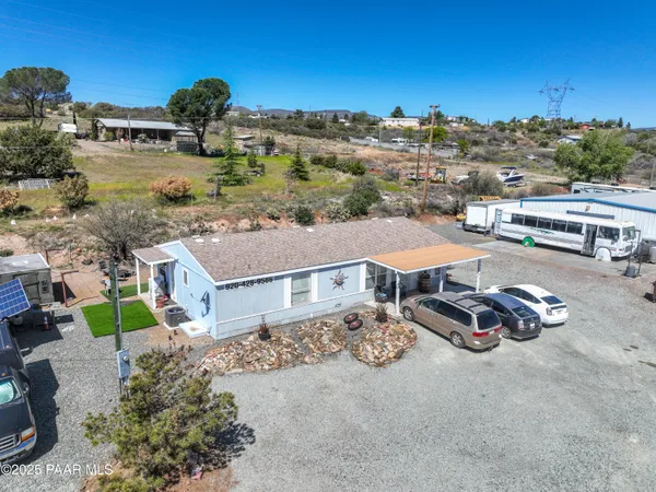 an aerial view of a house with a garden
