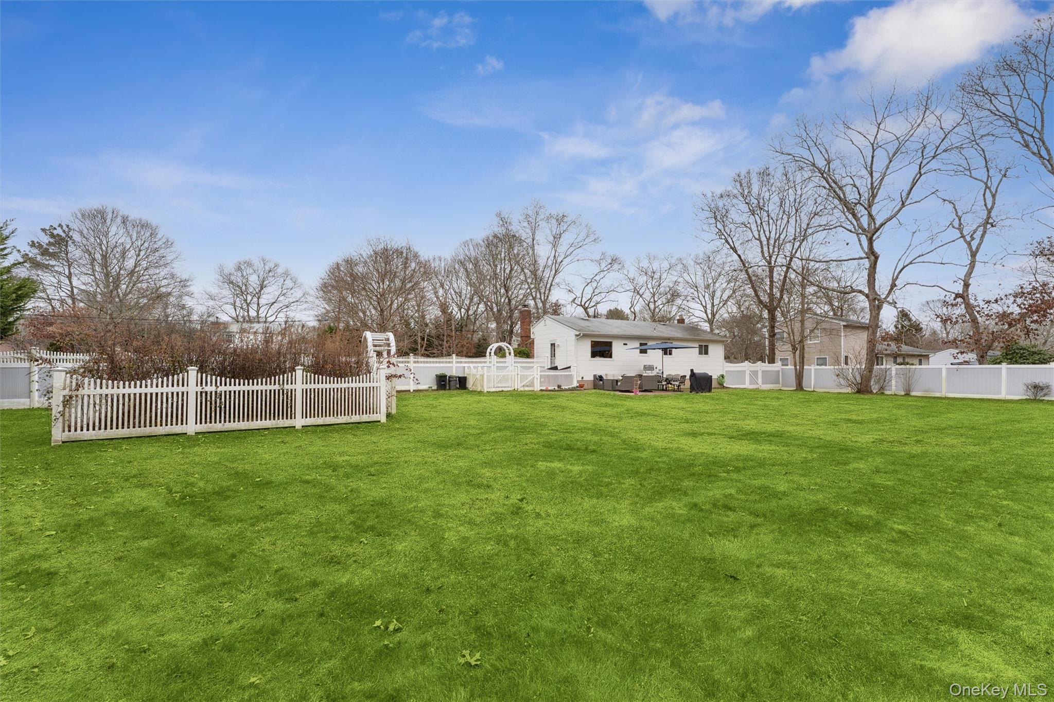 31 Howell Place Speonk, NY 11972 - Photo 4 of 16 View of fenced backyard