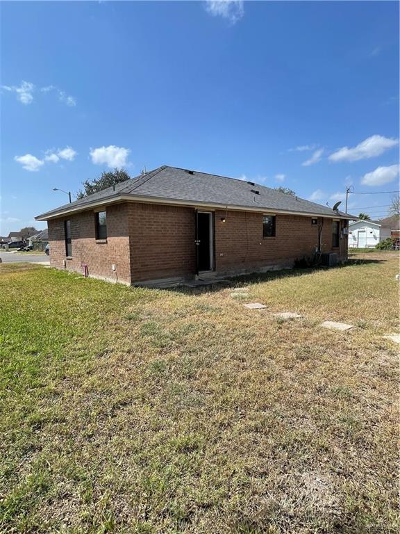 2306 Ocaso Road Mission, TX 78572 - Photo 11 of 12 a view of a terrace with a table and chairs