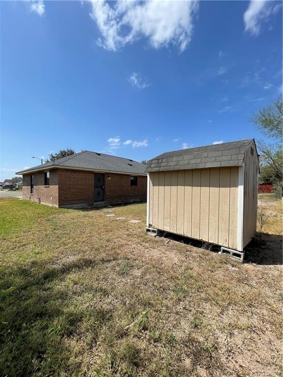 2306 Ocaso Road Mission, TX 78572 - Photo 12 of 12 a view of a house with a yard