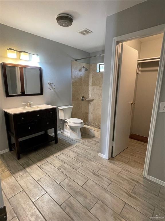 2306 Ocaso Road Mission, TX 78572 - Photo 6 of 12 a bathroom with a sink toilet and shower