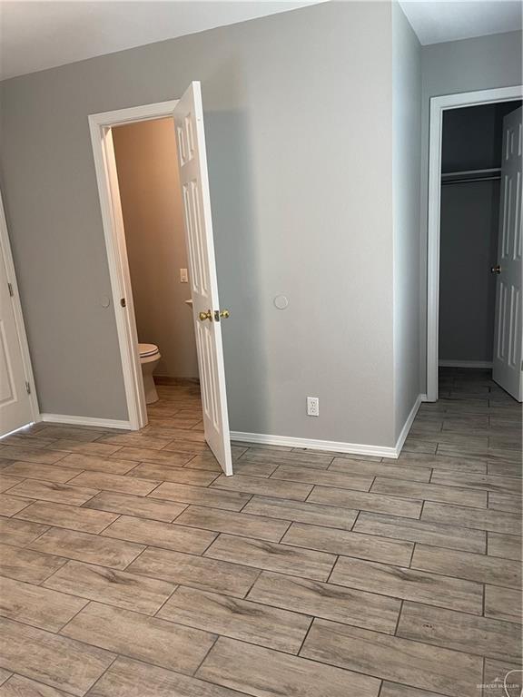 2306 Ocaso Road Mission, TX 78572 - Photo 8 of 12 an empty room with windows