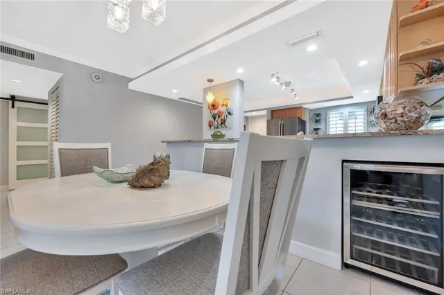 a view of kitchen island with stainless steel appliances