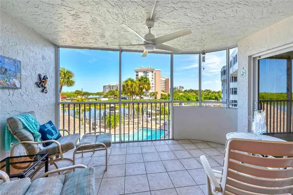 a view of a balcony dining area