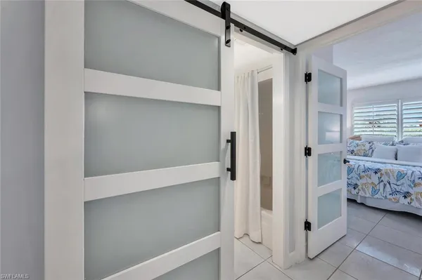 a view of room with window and hardwood