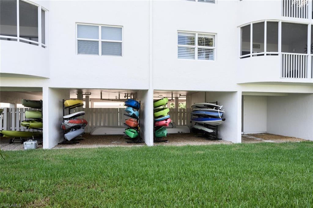 12945 Vanderbilt Drive, Unit 304 Naples, FL 34110 - Photo 38 of 45 a view of a yard in front of house