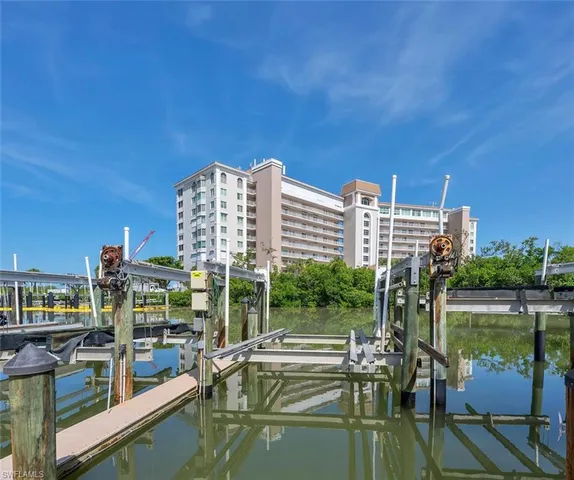 a view of a lake with tall buildings