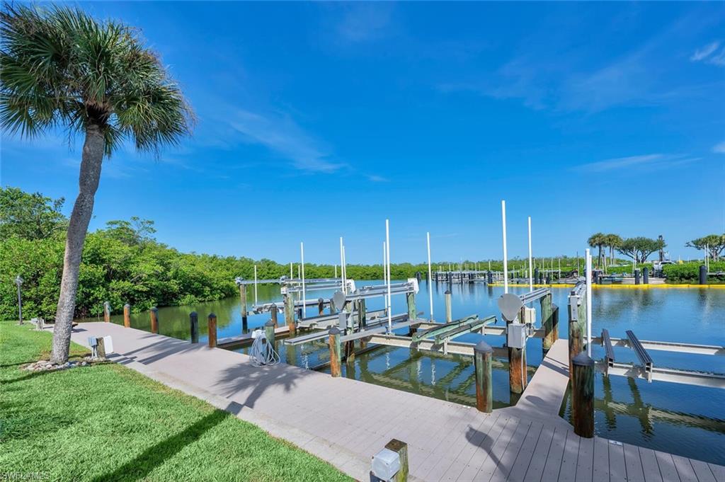 12945 Vanderbilt Drive, Unit 304 Naples, FL 34110 - Photo 42 of 45 a view of deck with patio