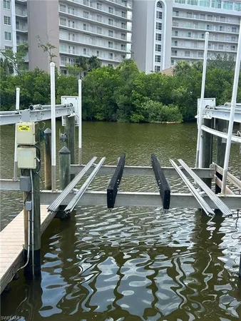 a view of a swimming pool with a lake view