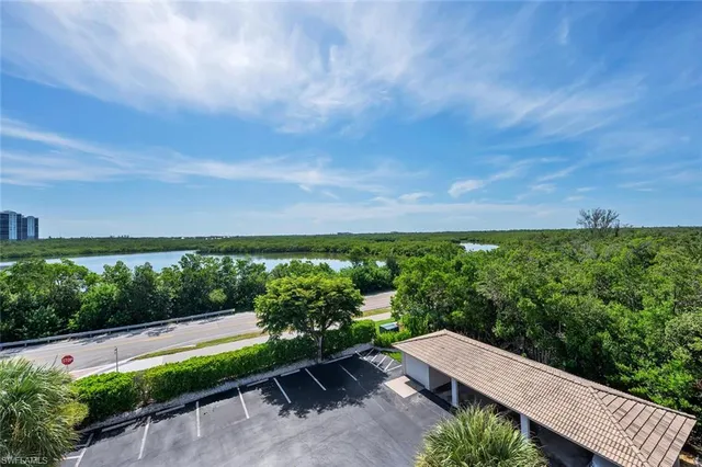 a view of a street with a yard
