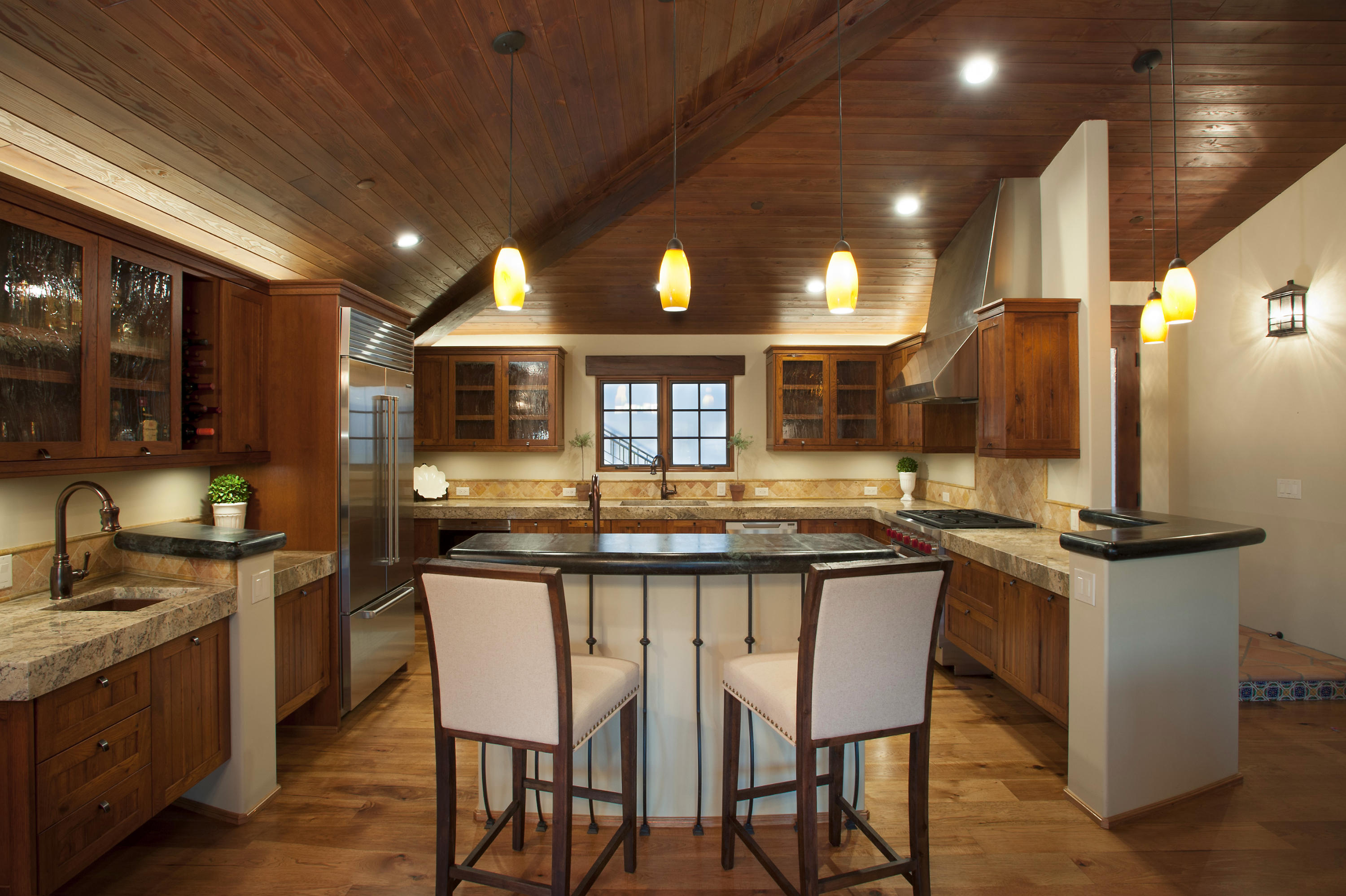 20 Alisal Road Santa Barbara, CA 93103 - Photo 15 of 33 a kitchen with granite countertop a sink and cabinets