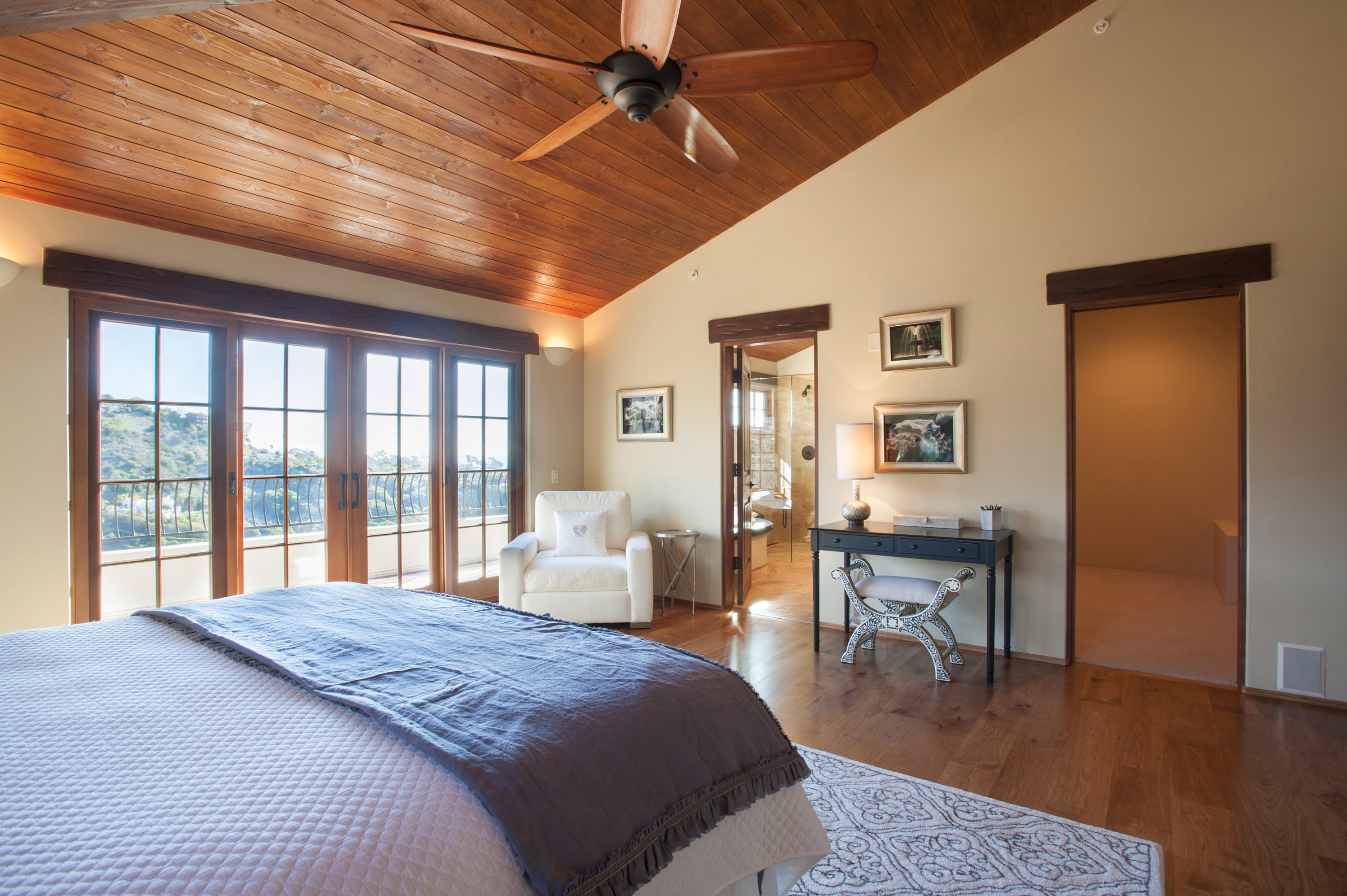 20 Alisal Road Santa Barbara, CA 93103 - Photo 18 of 33 a spacious bedroom with a large bed and a table