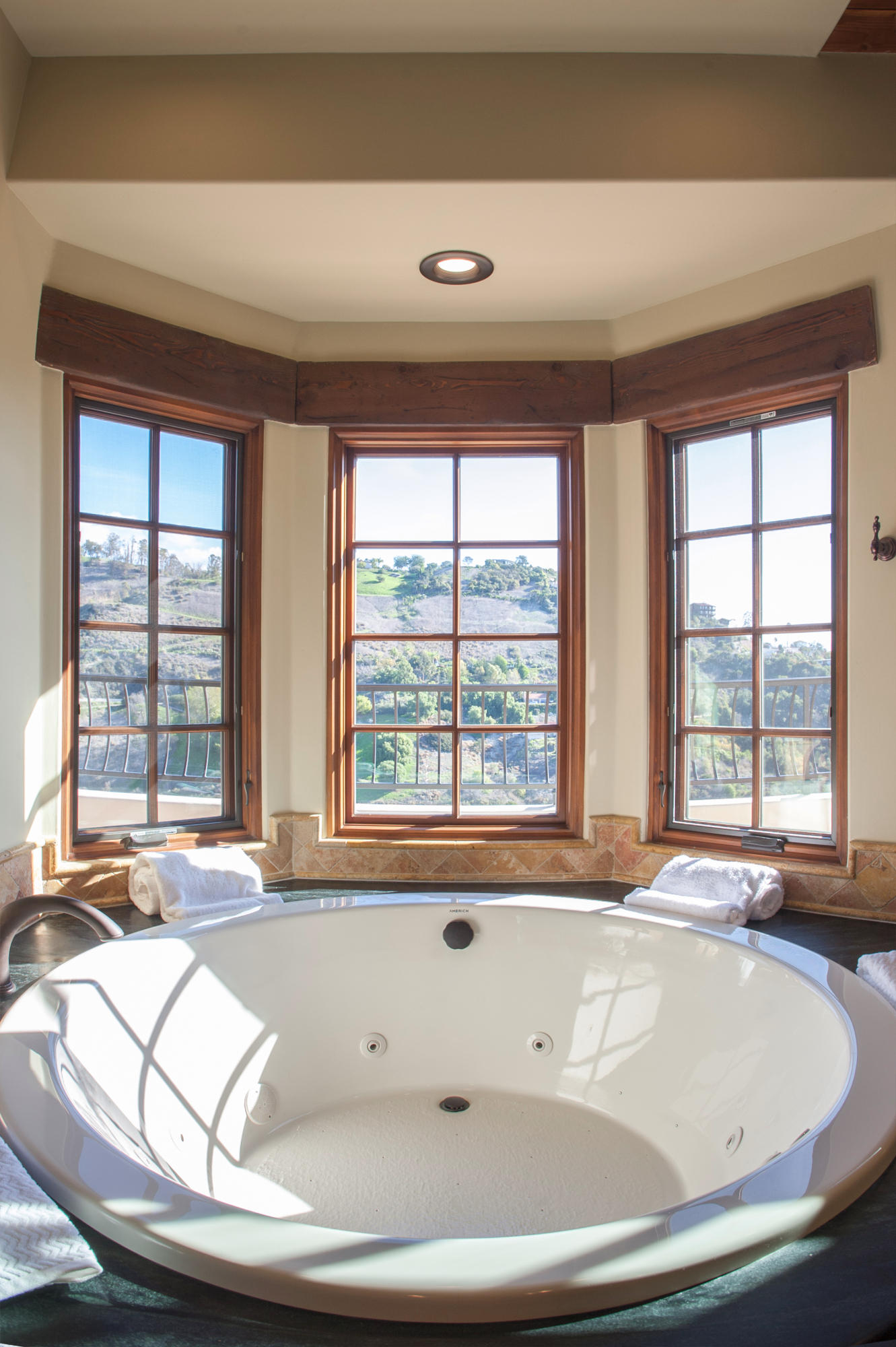 20 Alisal Road Santa Barbara, CA 93103 - Photo 20 of 33 a bath tub sitting in a bathroom next to a window