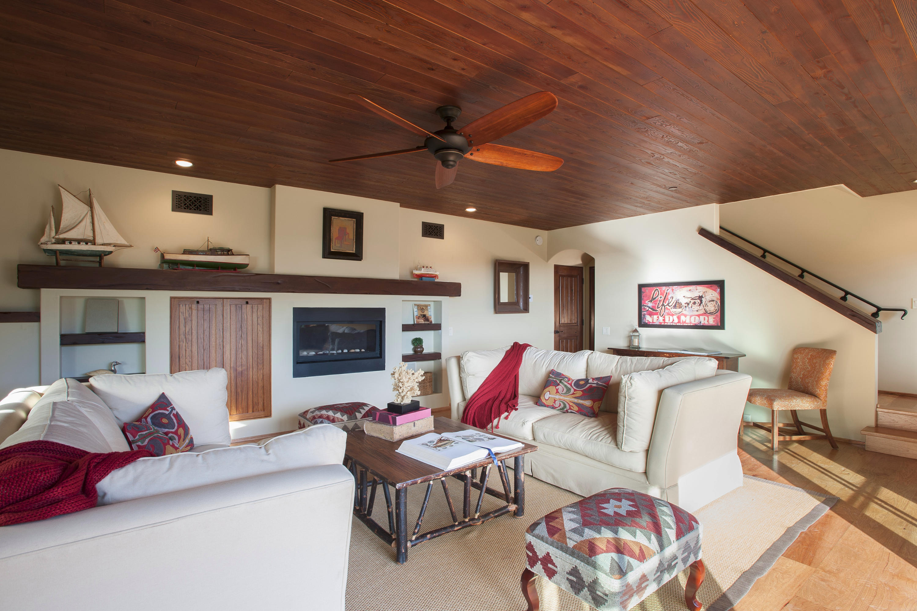 20 Alisal Road Santa Barbara, CA 93103 - Photo 27 of 33 a living room with furniture and a fireplace