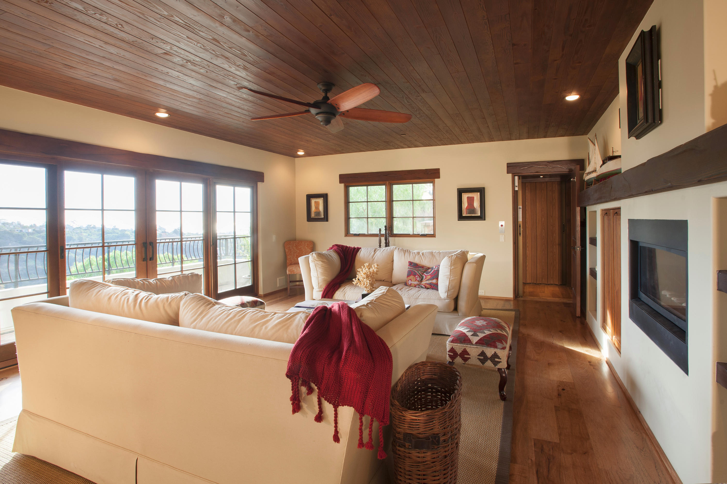 20 Alisal Road Santa Barbara, CA 93103 - Photo 28 of 33 a living room with furniture floor to ceiling window and potted plant