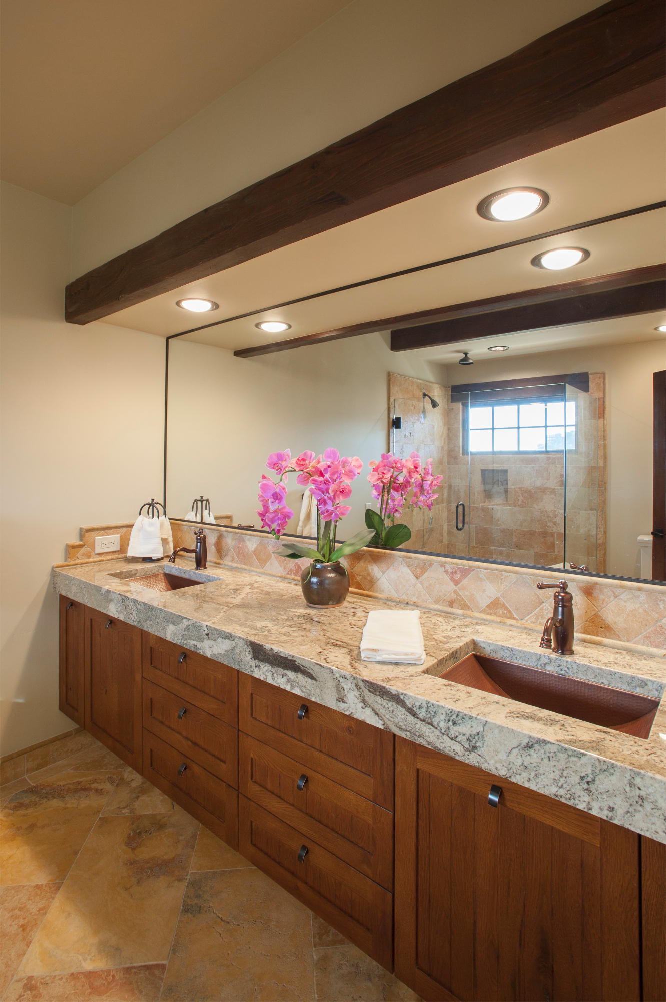20 Alisal Road Santa Barbara, CA 93103 - Photo 31 of 33 a bathroom with a granite countertop sink and a mirror