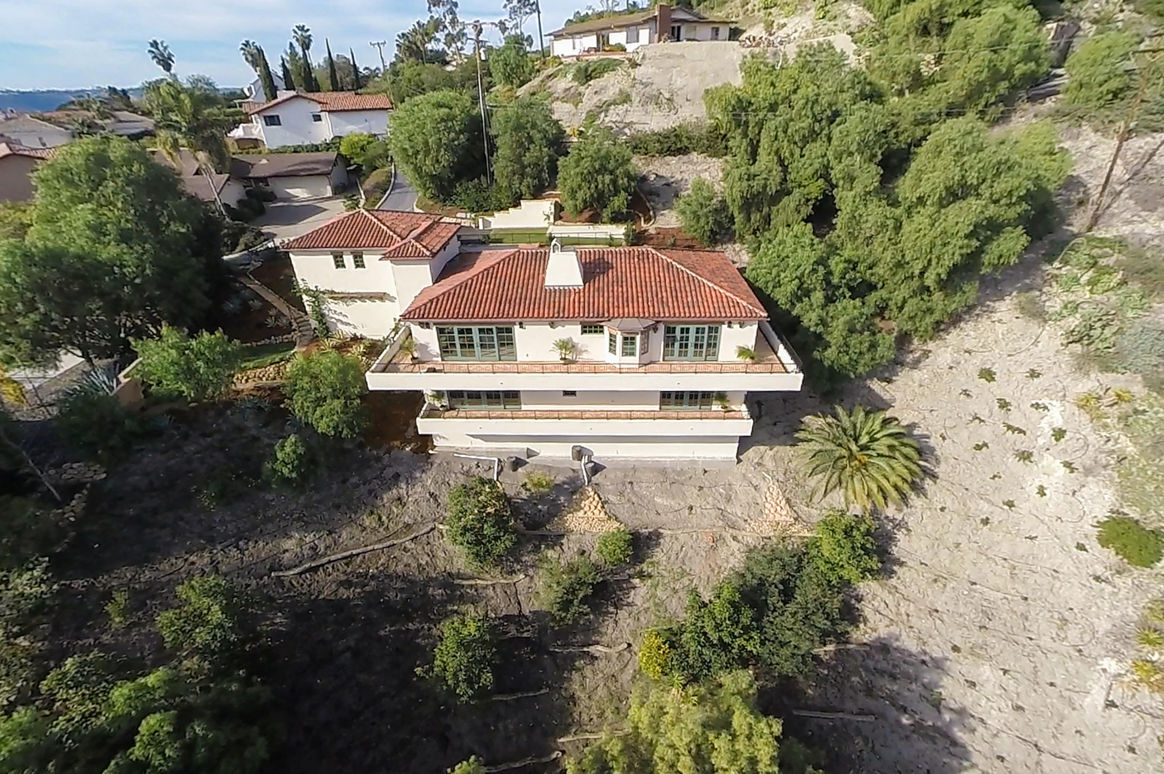 20 Alisal Road Santa Barbara, CA 93103 - Photo 8 of 33 an aerial view of a house with a yard and large trees