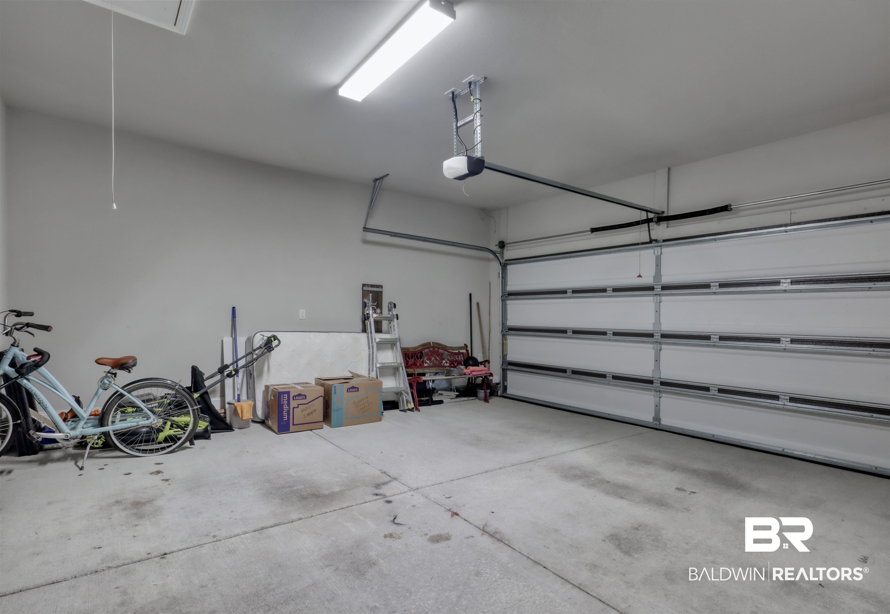 987 Gibson Court Foley, AL 36535 - Photo 34 of 34 Garage with a garage door opener