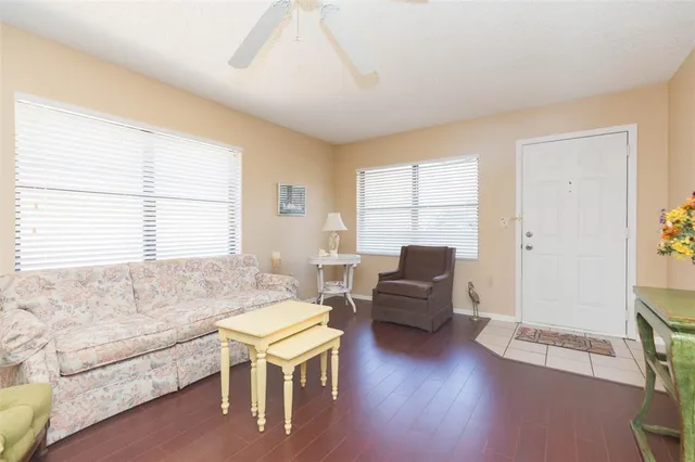 a living room with furniture and a window