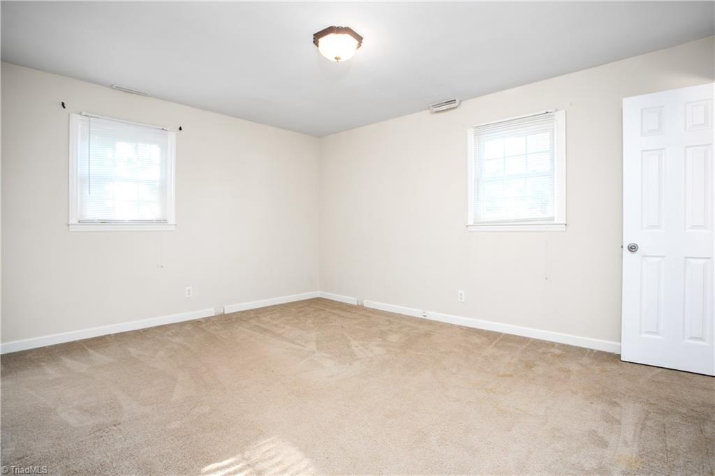 1096 Ralph Boyles Road King, NC 27021 - Photo 18 of 29 primary bedroom