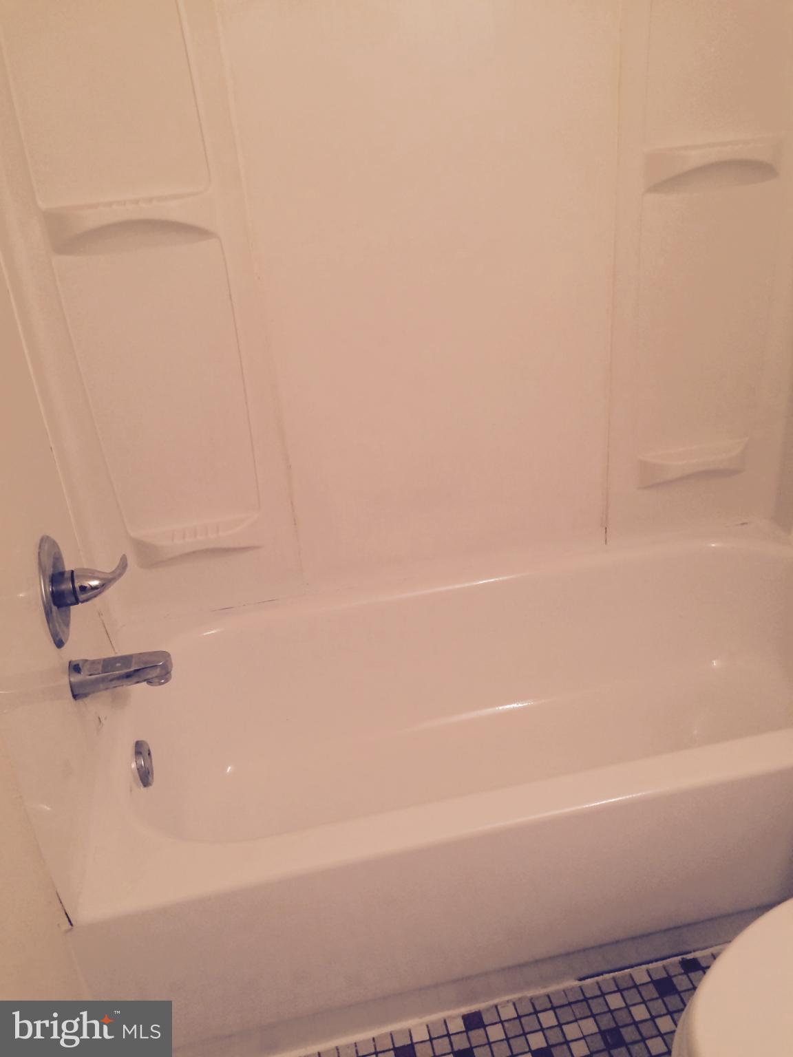 2940 Devereaux Avenue Philadelphia, PA 19149 - Photo 11 of 22 a bathroom with a bathtub