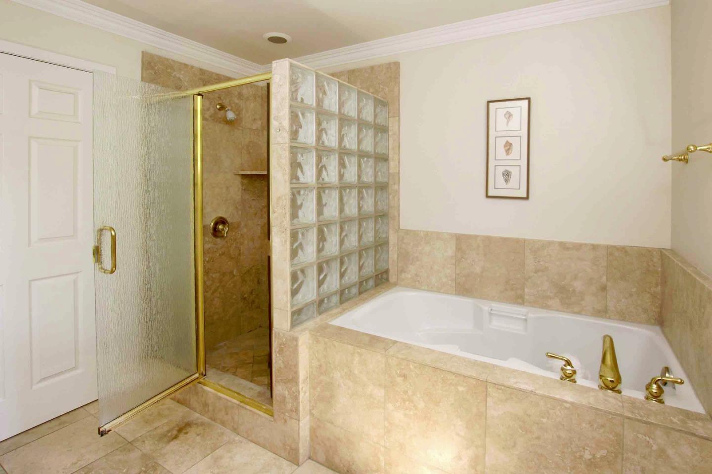 840 Seacliff Drive Aptos, CA 95003 - Photo 13 of 21 a bathroom with a bathtub and shower