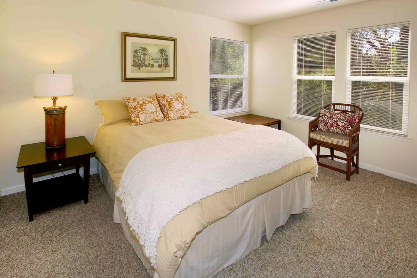 840 Seacliff Drive Aptos, CA 95003 - Photo 14 of 21 a bedroom with a bed and wooden floor