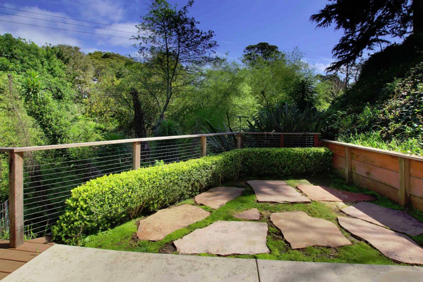840 Seacliff Drive Aptos, CA 95003 - Photo 16 of 21 a view of a garden with wooden fence