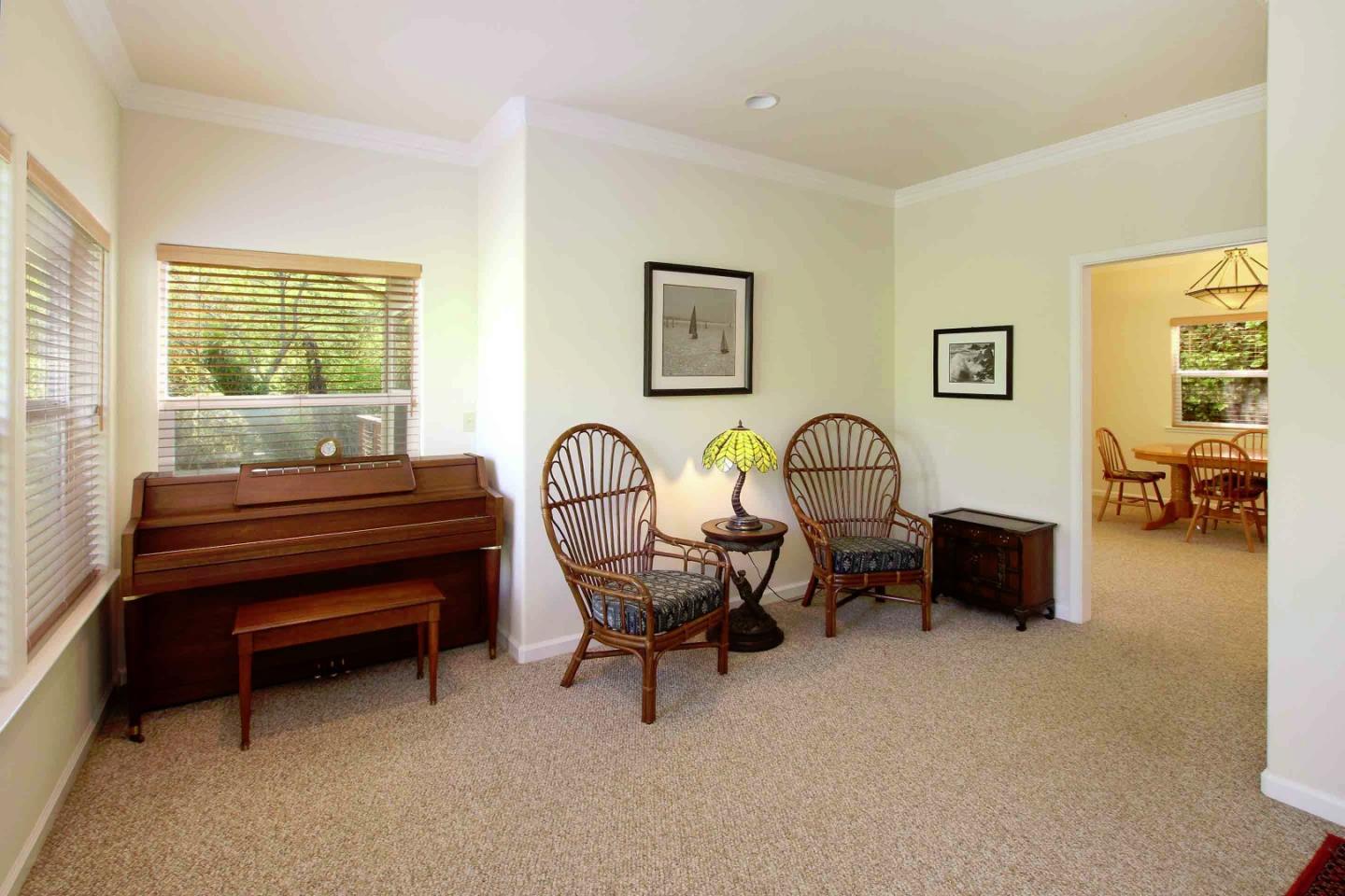 840 Seacliff Drive Aptos, CA 95003 - Photo 5 of 21 a living room with furniture a rug and a window