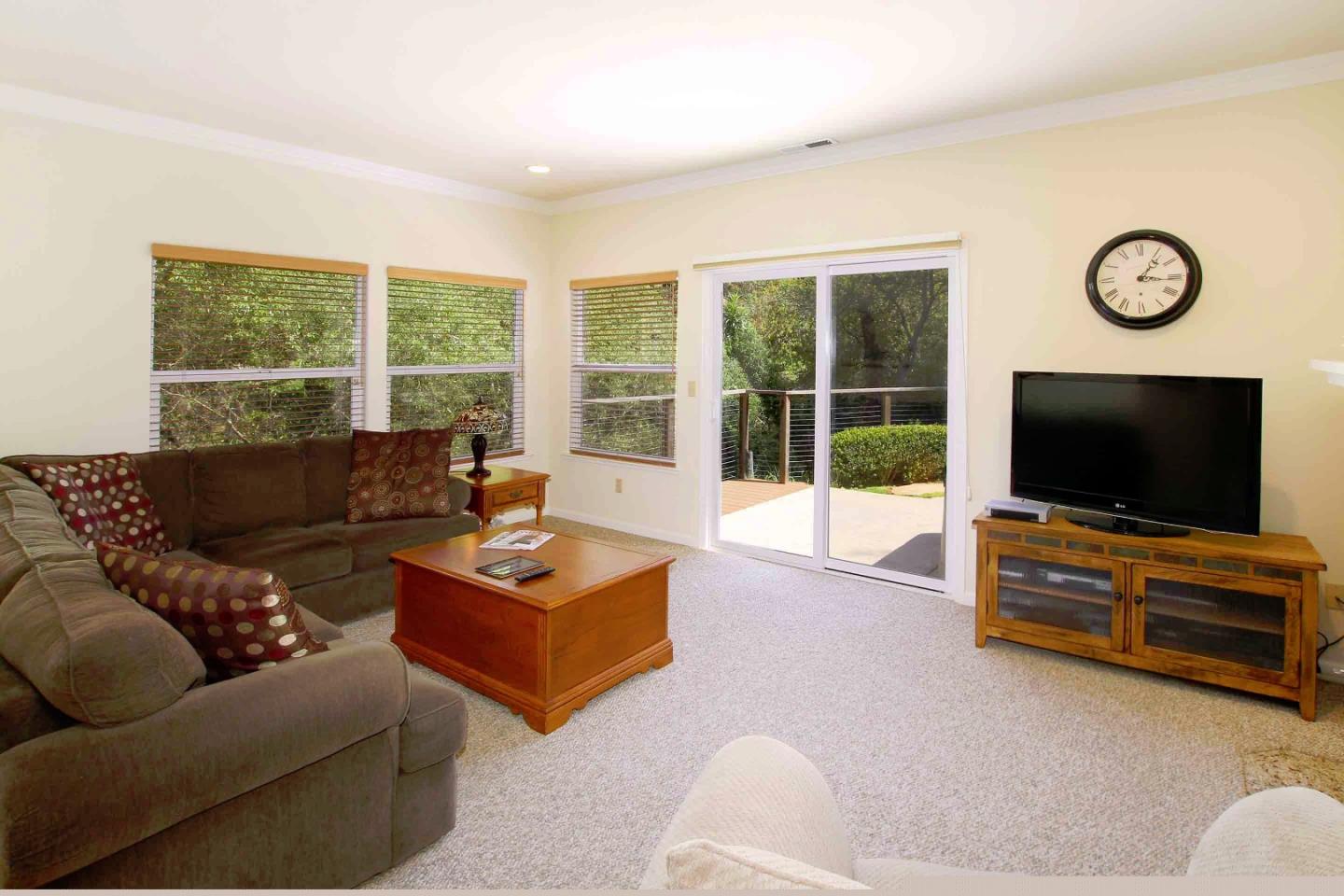 840 Seacliff Drive Aptos, CA 95003 - Photo 6 of 21 a living room with furniture and a flat screen tv