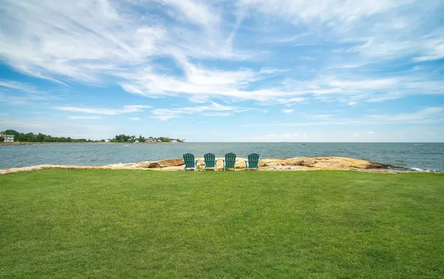 a view of a lake with a big yard