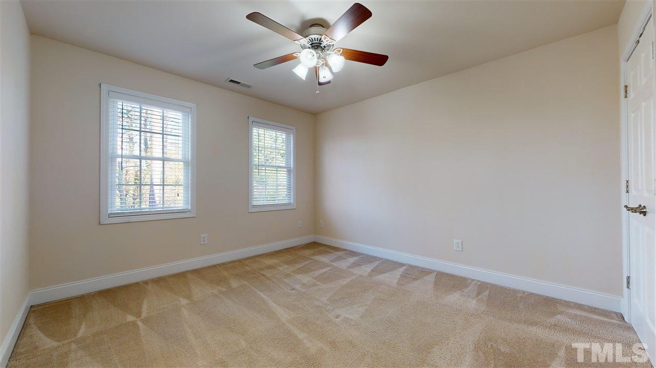 2105 Cook Road Durham, NC 27713 - Photo 12 of 29 a view of an empty room with a window