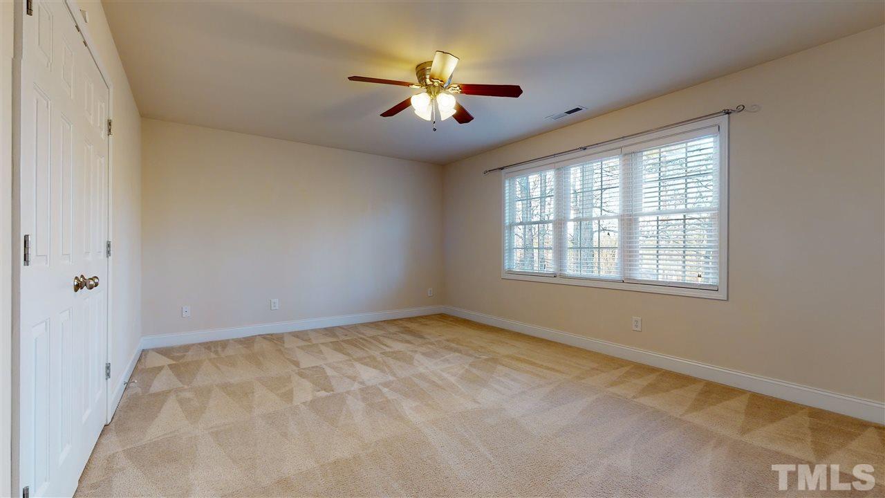 2105 Cook Road Durham, NC 27713 - Photo 18 of 29 a view of an empty room with a window