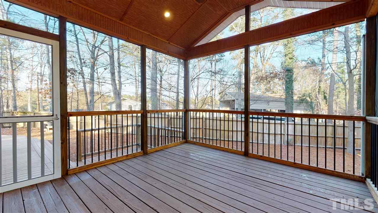 2105 Cook Road Durham, NC 27713 - Photo 23 of 29 a view of a porch with wooden floor