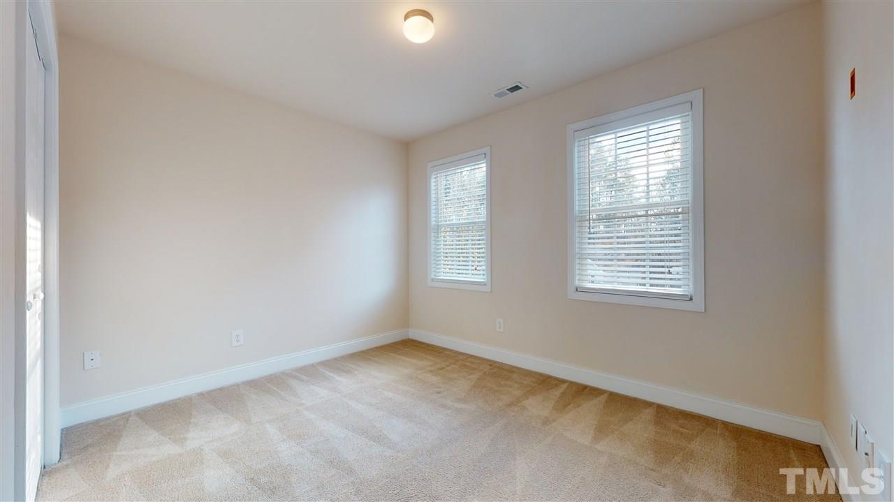 2105 Cook Road Durham, NC 27713 - Photo 7 of 29 an empty room with a window