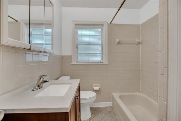 a bathroom with a sink and a tub