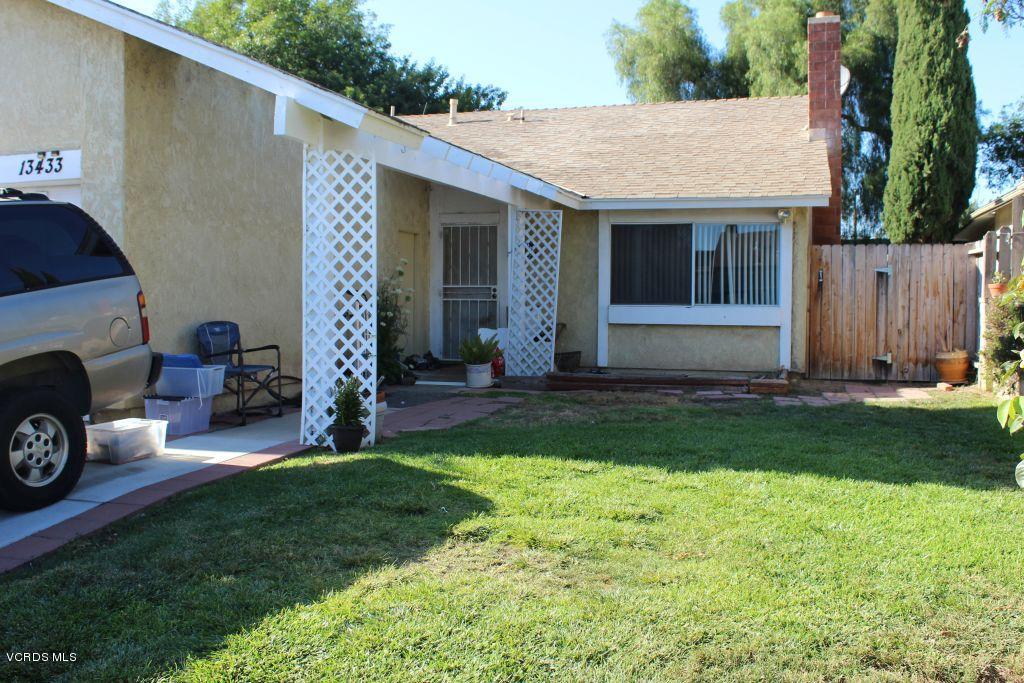 13433 Laurelhurst Road Moorpark, CA 93021 - Photo 22 of 23 a view of a house with backyard porch and garden
