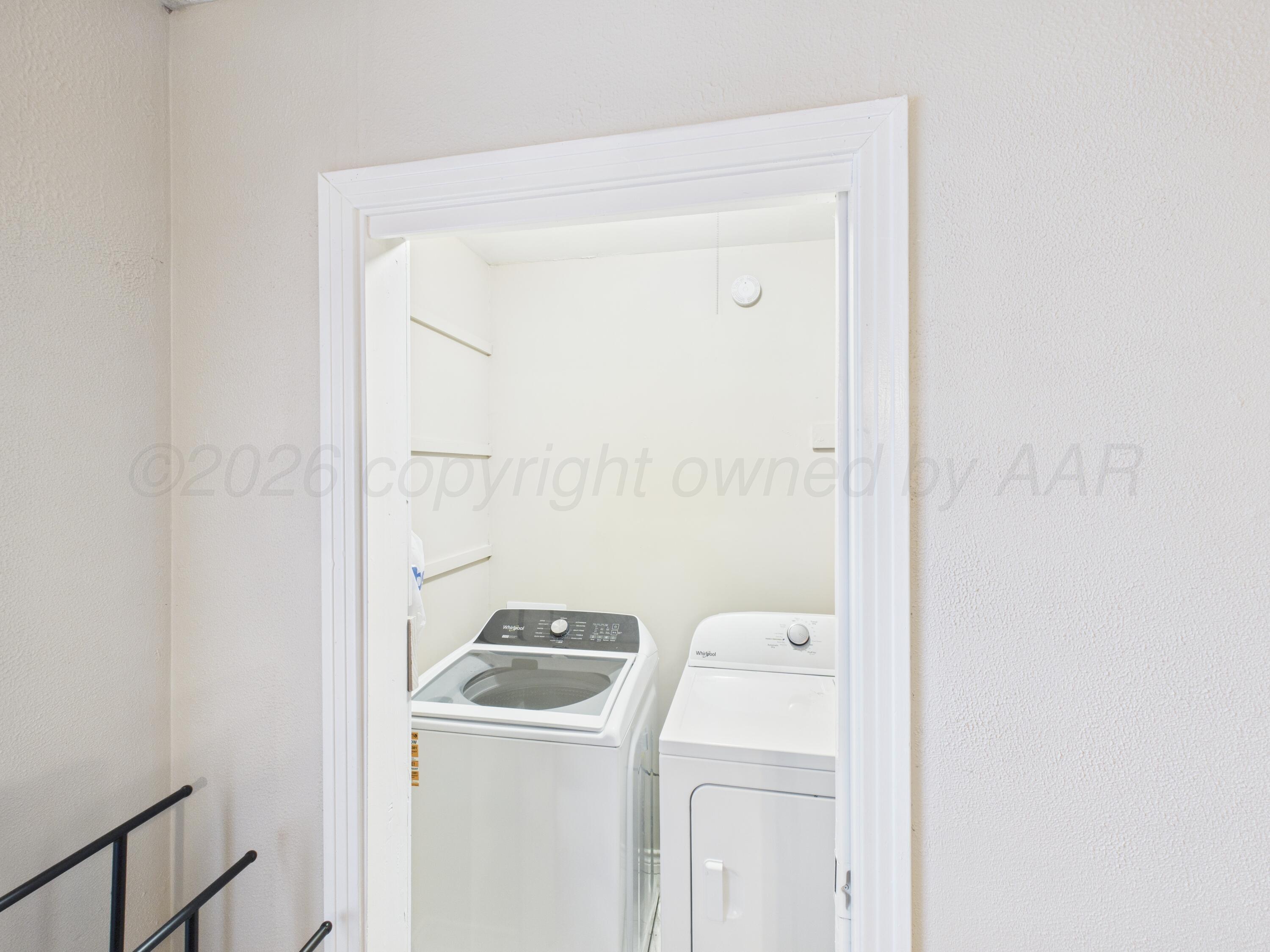 1816 Tularosa Street Amarillo, TX 79102 - Photo 16 of 24 a utility room with dryer and washer