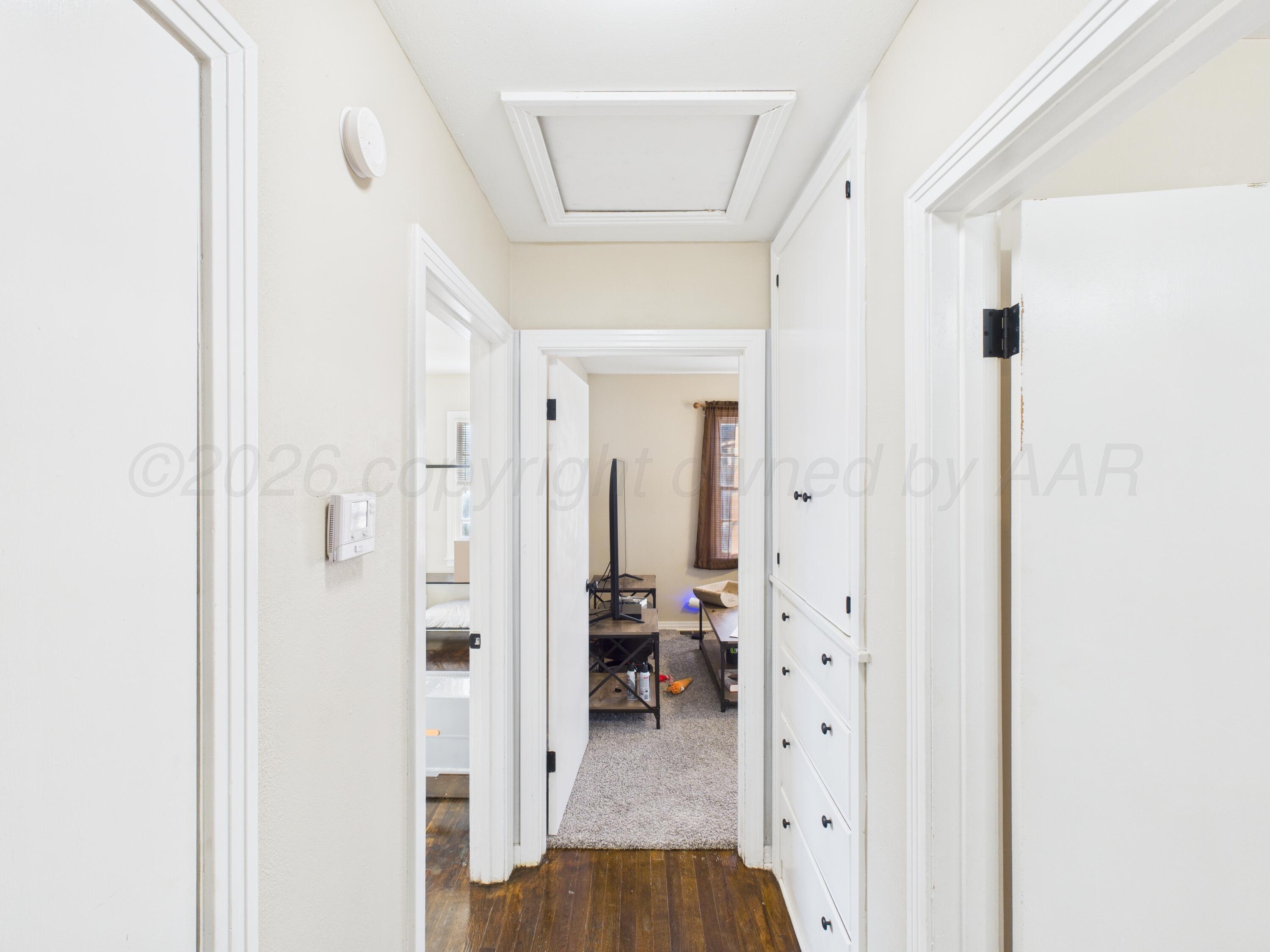 1816 Tularosa Street Amarillo, TX 79102 - Photo 6 of 24 a view of a hallway with a livingroom and a dinning area