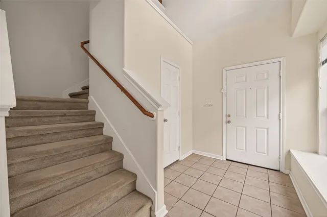 a view of an entryway with staircase