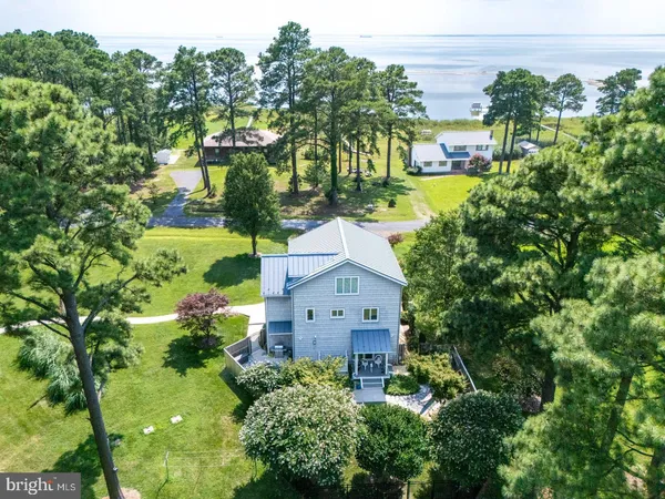 an aerial view of a house with a garden