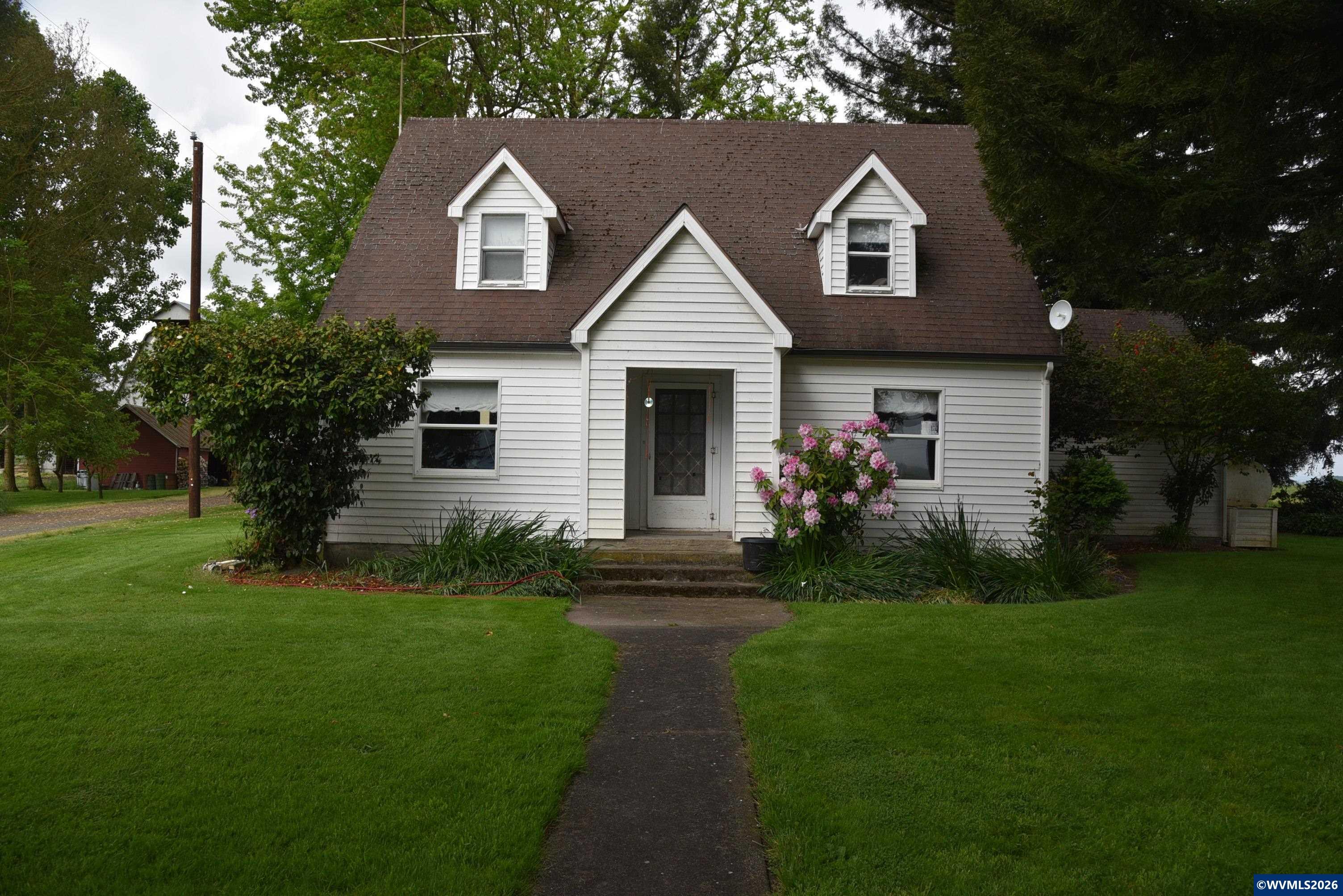25258 Rowland Road Harrisburg, OR 97446 - Photo 9 of 24 a front view of house with yard and green space