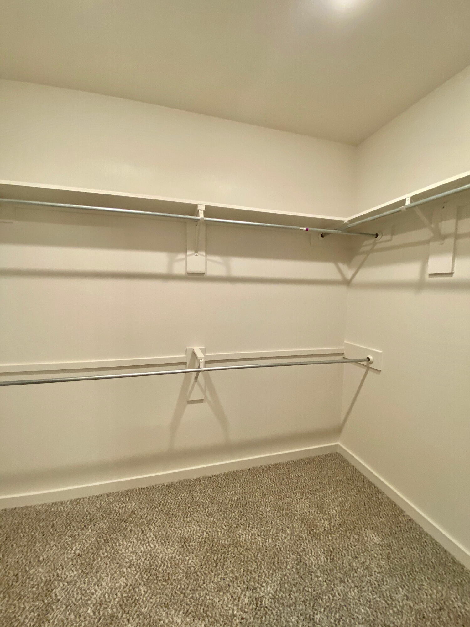 2725 137th Street Lubbock, TX 79423 - Photo 11 of 17 a view of an empty walk in closet